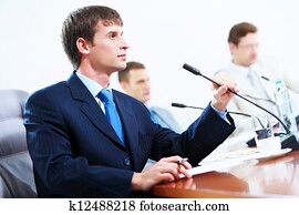 Three businesspeople at meeting