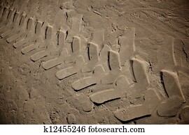Tire marks on a sand