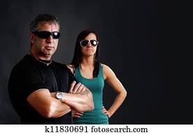 Tough guy with biker chick Tough guy with biker chick