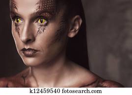 Woman with snake body-art Woman with snake body-art