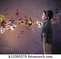 Young boy listening to music Young boy listening to music