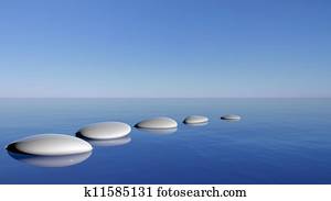 Zen stones in the blue water
