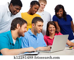 A group of multi-cultural college students/friends gathered around a computer