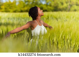 African American woman in a wheat field - African people