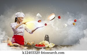 Asian female cooking with magic Asian female cooking with magic