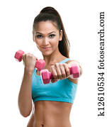 Athletic young woman works out with dumbbells