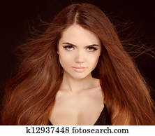 Beautiful girl with flying blond hair. Brown Long Hair. 
