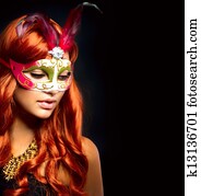 Beautiful Woman in a Carnival mask. Isolated on Black Beautiful Woman in a Carnival mask. Isolated on Black