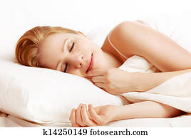 beautiful woman sleeping and smiles in his sleep in bed beautiful woman sleeping and smiles in his sleep in bed
