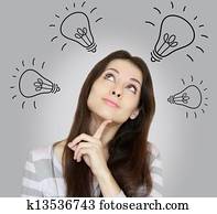 Beautiful woman thinking many ideas and looking up on grey background Beautiful woman thinking many ideas and looking up on grey background