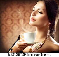 Beautiful Woman With Cup of Coffee or Tea 