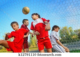 Boys playing soccer