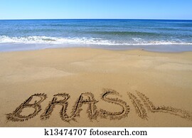 Brasil written on sandy beach Brasil written on sandy beach