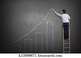 business man drawing growth chart