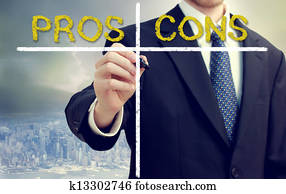 Business man writing pros and cons