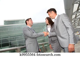 Business people shaking hands