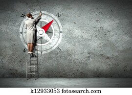 Business woman drawing compass