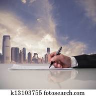 Businessman is signing a contract