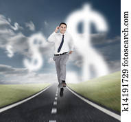 Businessman running on a road with dollars floating