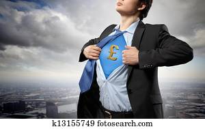 Businessman showing superman suit underneath shirt Businessman showing superman suit underneath shirt