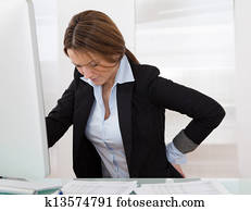 Businesswoman With Back Pain Businesswoman With Back Pain