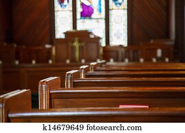 Church Pews with Stained Glass Beyond Pulpit Church Pews with Stained Glass Beyond Pulpit