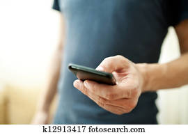 Close up of a man using mobile smart phone Close up of a man using mobile smart phone
