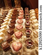 Colorful desserts and pastry served on a wedding party Colorful desserts and pastry served on a wedding party