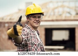 Construction worker gesturing thumbs up
