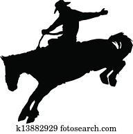 Cowboy riding horse at rodeo. Cowboy riding horse at rodeo.