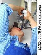 Craftsman repairing Pipes in a house