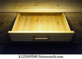 cupboard with opened drawer