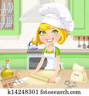 Cute blond girl baking cookies on kitchen Cute blond girl baking cookies on kitchen