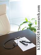 Doctor office table desk with stethoscope and otoscope