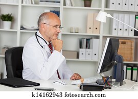 doctor working with computer