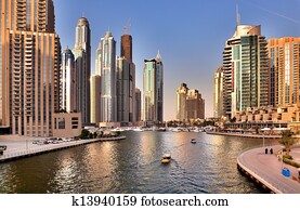 DUBAI, UAE - OCTOBER 23: View of the region of Dubai - Dubai Marina is an artificial canal city, carved along a two mile (3 km) stretch of Persian Gulf shoreline on october 23, 2012 in Dubai, UAE 