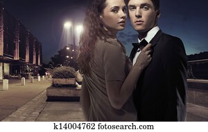 Elegant young couple in the middle of the night Elegant young couple in the middle of the night