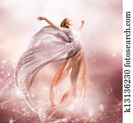 Fairy. Beautiful Girl in Blowing Dress Flying. Magic Fairy. Beautiful Girl in Blowing Dress Flying. Magic