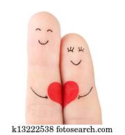 family concept - a man and a woman hold on the red heart, painted at fingers and isolated on white background