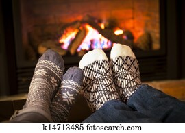 Feet warming by fireplace Feet warming by fireplace