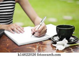 Female hand writing. Female hand writing.