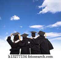 four graduate students looking at sky four graduate students looking at sky
