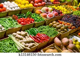 Fruit market with various colorful fresh fruits and vegetables
