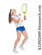 Full length portrait of happy tennis player rejoicing in success