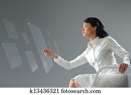 Future technology. Girl press button touchscreen interface. Future technology. Girl press button touchscreen interface.