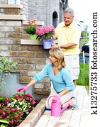 Gardening senior couple.