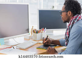 Graphic designer using a graphics tablet Graphic designer using a graphics tablet