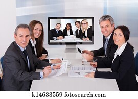 Group Of Businesspeople In Video Conference