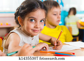 Group of cute little preschool kids drawing Group of cute little preschool kids drawing