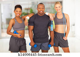 group of diversity people holding various gym equipment